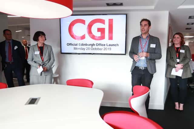 Adam McVey, Edinburgh City Council Leader (right of centre), Tara McGeehan, CGI UK President (left of centre) and Lindsay McGranaghan, Business Unit Lead Scotland at CGI (right)
