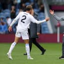 Matty Cash of Aston Villa shakes hands with Unai Emery after the win over Burnley.