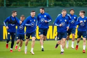 The Scotland squad train ahead of flying out to Copenhagen to face Denmark in the latest World Cup qualifier. (Photo by Ross MacDonald / SNS Group)