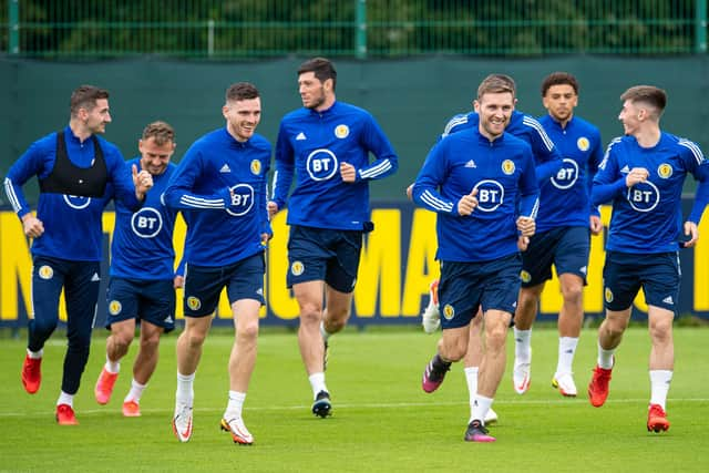 The Scotland squad train ahead of flying out to Copenhagen to face Denmark in the latest World Cup qualifier. (Photo by Ross MacDonald / SNS Group)