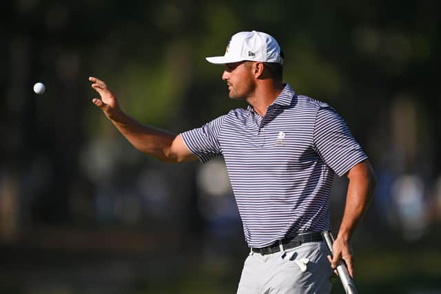 Bryson DeChambeau catches his ball on the second green during the second round at Pinehurst Resort. Picture: Ross Kinnaird/Getty Images.