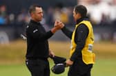 Xander Schauffele celebrates with his caddie Austin Kaiser on the 18th green after winnin the 152nd Open at Royal Troon. Picture: Andrew Redington/Getty Images.