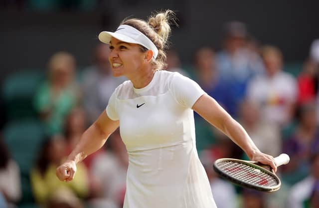 Simona Halep celebrates winning through to the quarter-finals.