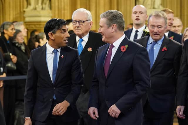 Rishi Sunak and Keir Starmer chat ahead of the State Opening of Parliament in the House of Lords last month (Picture: Stefan Rousseau/WPA pool/Getty Images)