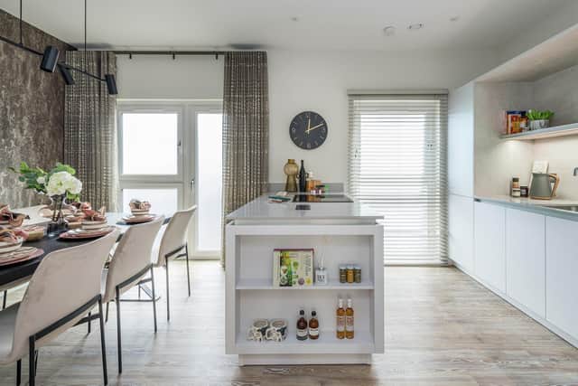 Interior The ground floor features a garden room, or third bedroom, with French doors opening to a private outdoor area. The first floor comprises an open-plan kitchen and dining room, bathroom and lounge. Upstairs, is a principal bedroom suite and second bedroom with ensuite.