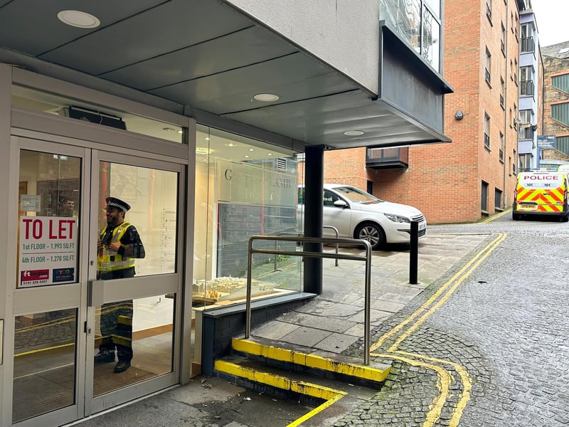 Police are stood outside the Edinburgh-based headquarters of the SNP following the arrest of its former chief executive Peter Murrell.