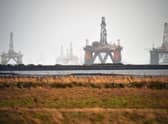 Oil rigs stacked up in the Cromarty Firth during a previous price slump (Picture: Jeff J Mitchell/Getty Images)