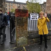 Nicola Sturgeon and candidate Roza Salih outside the polling station at the Annette Street school in Govanhill, Glasgow