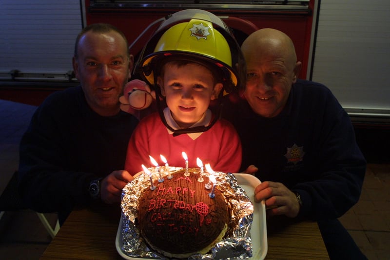 Birthday boy with firefighters