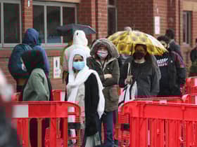 People queuing in the car park for a vaccination at the Glasgow Central Mosque in Glasgow. Glasgow and Moray remain in level three restrictions despite the rest of mainland Scotland moving to level two on Monday. Picture: PA