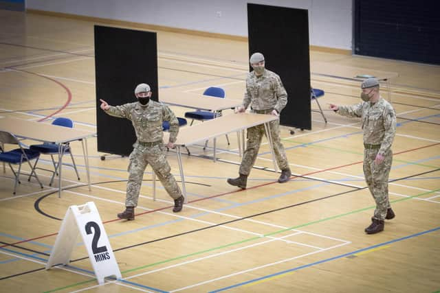 Members of the Royal Scots Dragoon Guard carry out a reconnaissance before setting up a Covid–19 vaccination centre at the Ravenscraig Regional Sports Facility in Motherwell, Lanarkhire. Picture date: Monday January 18, 2021. PA Photo. See PA story SCOTLAND Coronavirus Vaccine.  Jane Barlow/PA Wire