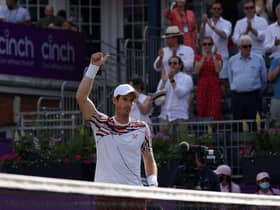 Andy Murray celebrates winning against France's Benoit Paire during the first round at Queen's Club.