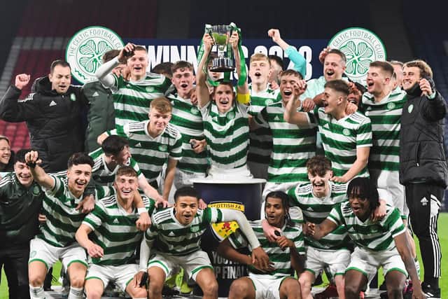 Celtic's Kyle Ure lifts the trophy after the 6-5 win over Rangers in the Youth Cup Final at Hampden. (Photo by Ross MacDonald / SNS Group)