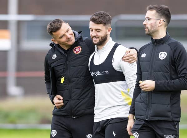 Craig Halkett with Lee McCulloch during Hearts' training session.  (Photo by Mark Scates / SNS Group)