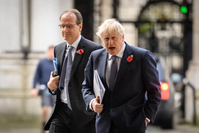 Martin Reynolds, left, Boris Johnson's former principal private secretary in November 2020, alongside the former prime minister. Picture: Leon Neal/Getty Images