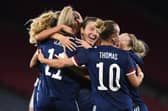 The Scotland players celebrate Jenna Clark's goal against Faroe Islands at Hampden Park. (Photo by Craig Foy / SNS Group)