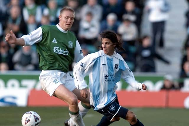 Action from the last time Dundee beat Hibs at Easter Road - in October 2001. Ulrik Laursen (left) of Hibs chases Dundee winger Beto Carranza