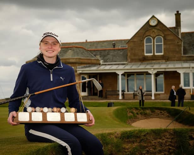Murcar Links player Jasmine Mackintosh shows off the Helen Holm Scottish Women's Open Trophy after her win at Troon. Picture: Scottish Golf.