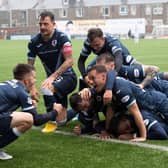 Raith Rovers players celebrate scoring against Dunfermline on Saturday.