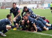 Raith Rovers players celebrate scoring against Dunfermline on Saturday.