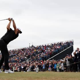 Dustin Johnson of the United States tees off on the 16th hole during Day Two of The 150th Open at St Andrews Old Course on July 15, 2022 in St Andrews, Scotland.