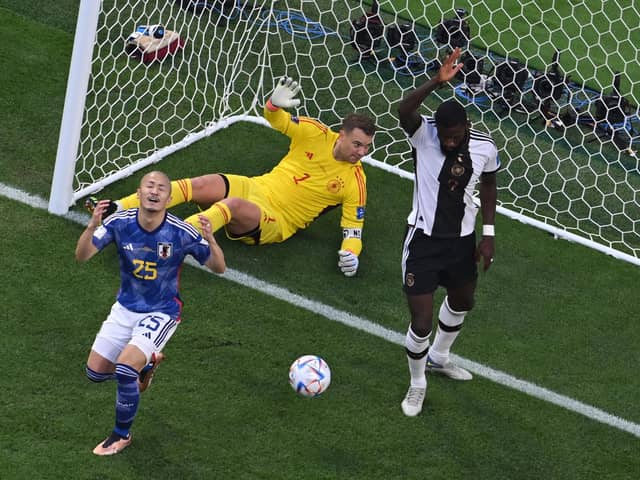 Celtic forward Daizen Maeda reacts after scoring an offside goal for Japan in their 2-1 win over Germany at the World Cup. (Photo by ANTONIN THUILLIER/AFP via Getty Images)