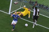 Celtic forward Daizen Maeda reacts after scoring an offside goal for Japan in their 2-1 win over Germany at the World Cup. (Photo by ANTONIN THUILLIER/AFP via Getty Images)