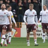 Hearts players look dejected after Motherwell open the scoring on their way to victory over their guests at Fir Park. Photo by Craig Foy / SNS Group