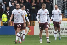 Hearts players look dejected after Motherwell open the scoring on their way to victory over their guests at Fir Park. Photo by Craig Foy / SNS Group