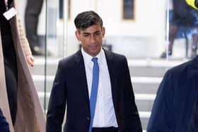 Rishi Sunak leaves the UK Covid-19 Inquiry, in west London, on December 11 (Photo by HENRY NICHOLLS/AFP via Getty Images)