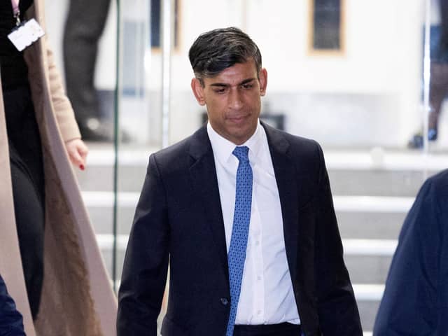 Rishi Sunak leaves the UK Covid-19 Inquiry, in west London, on December 11 (Photo by HENRY NICHOLLS/AFP via Getty Images)
