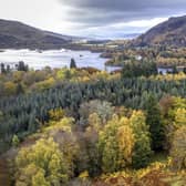 The ruins of Dunalastair House, near Pitlochry, Perthshire, are surrounded by trees displaying their autumn colours.