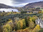 The ruins of Dunalastair House, near Pitlochry, Perthshire, are surrounded by trees displaying their autumn colours.