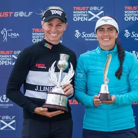 Kelsey MacDonald, right, shows off the Jock MacVicar Leading Scot Trophy alongside Trust Golf Scottish Women's Open winner Ryann O'Toole at Dumbarnie Links. Picture: Tristan Jones