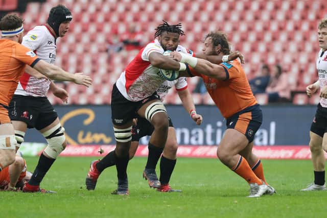Try-scorer Vincent Tshituka looks to get past Pierre Schoeman during the Lions' win over Edinburgh at Ellis Park. Photo by BackpagePix/Shutterstock