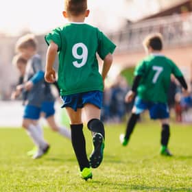 Boys playing in a soccer match. Picture: Getty Images