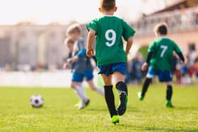 Boys playing in a soccer match. Picture: Getty Images