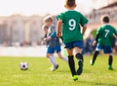 Boys playing in a soccer match. Picture: Getty Images