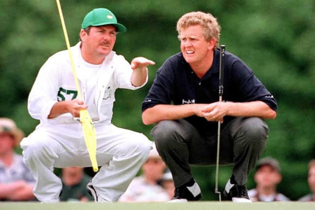 Colin Montgomerie ponders a putt with his caddie Alastair McLean during one of his appearances at Augusta National Golf Club. Picture: ROBERT SULLIVAN/AFP via Getty Images.