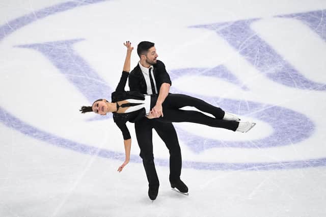 Great Britain's Lilah Fear and Lewis Gibson perform during the ice dance programme event at the ISU World Figure Skating Championships in Stockholm on March 26, 2021. (Photo by Jonathan NACKSTRAND / AFP) (Photo by JONATHAN NACKSTRAND/AFP via Getty Images)