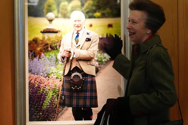 The Princess Royal unveils a new portrait of King Charles III during a visit to the Scottish Parliament at Holyrood in September. Picture: Andrew Milligan/PA Wire
