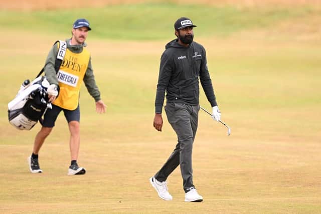 Sahith Theegala and his caddie on the fourth hole at St Andrews. Picture: Ross Kinnaird/Getty Images.