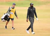 Sahith Theegala and his caddie on the fourth hole at St Andrews. Picture: Ross Kinnaird/Getty Images.