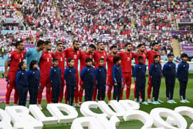 The Iran players refused to sing the national anthem. (Photo by Matthias Hangst/Getty Images)