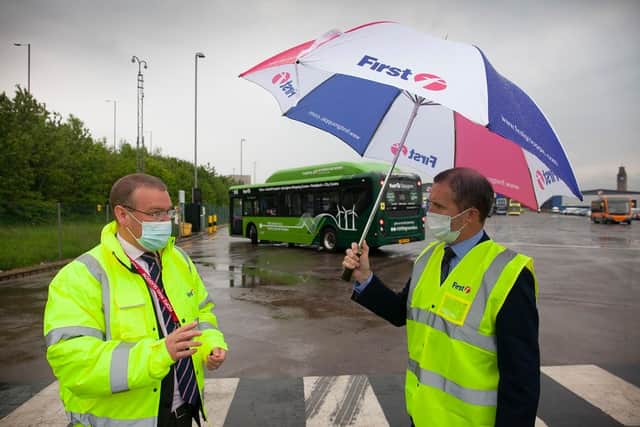 Andrew Jarvis of First Bus with Transport Secretary Michael Matheson. Picture: First Bus