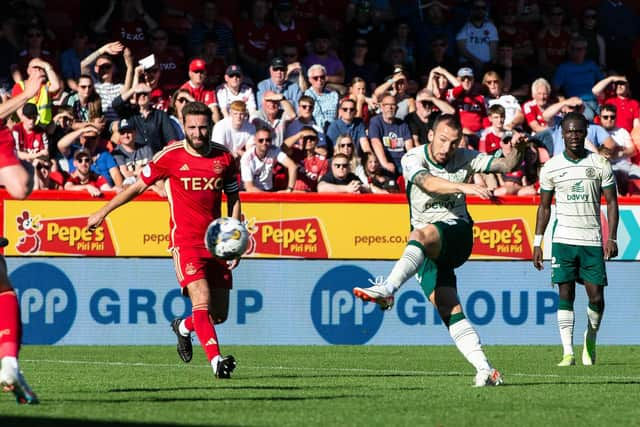 Adam Le Fondre opened the scoring for Hibs in their 2-0 win over Aberdeen at Pittodrie.