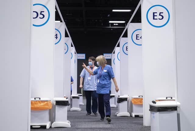 Members of the Vaccination Team in the vaccine areas at the coronavirus mass vaccine centre at the Edinburgh International Conference Centre