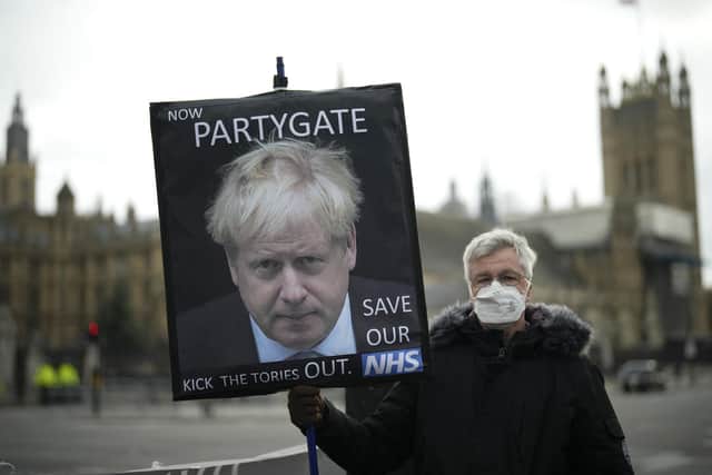 Police recommend 20 fines should be initially issued over Downing Street parties which broke lockdown rules (AP Photo/Matt Dunham, File).