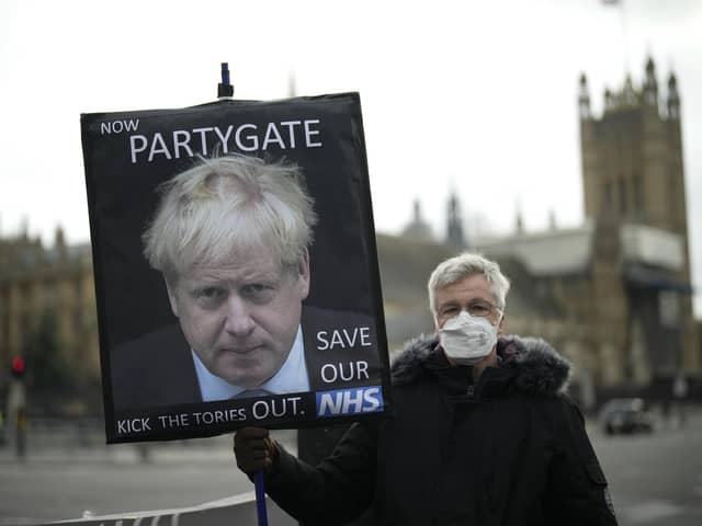 Police recommend 20 fines should be initially issued over Downing Street parties which broke lockdown rules (AP Photo/Matt Dunham, File).