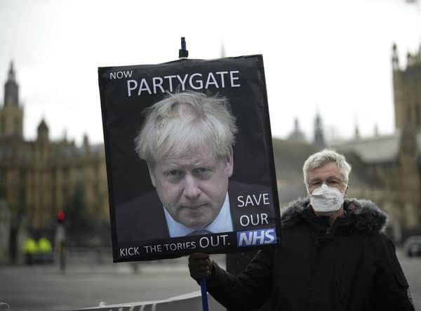 Police recommend 20 fines should be initially issued over Downing Street parties which broke lockdown rules (AP Photo/Matt Dunham, File).